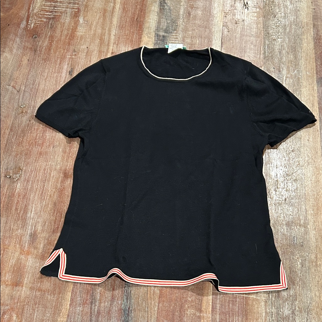 Black Woven Cotton With Notched Red And White Ribbon Hem.